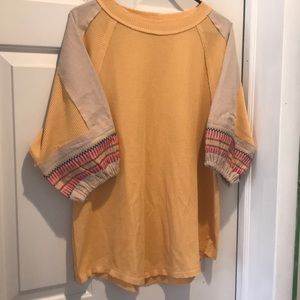 Happy golden top with embroidered sleeves!